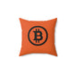 Orange pillow with Bitcoin symbol on a white background